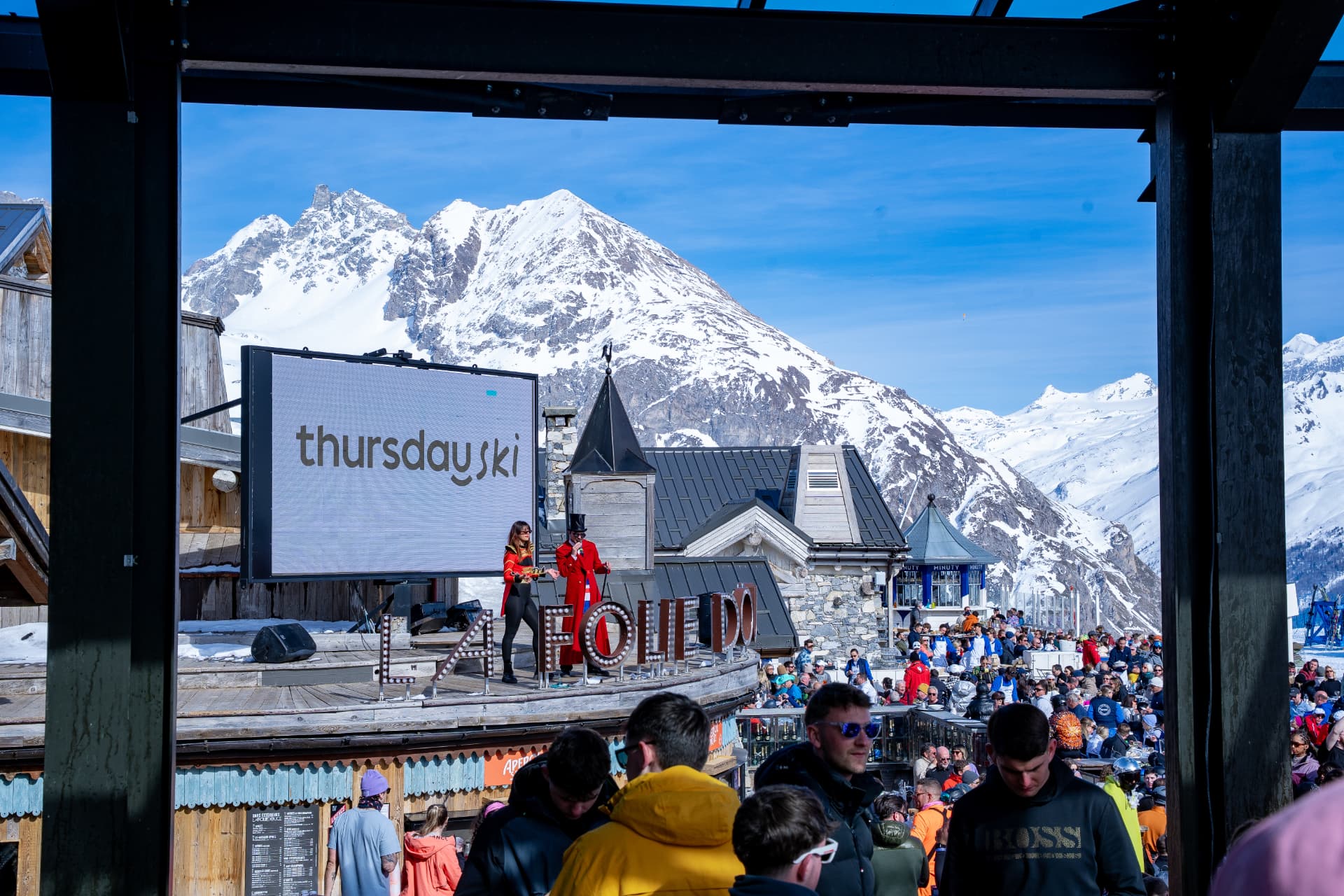 Thursday Ski big screen at a packed mountain venue